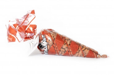 16 oz of fresh roasted, crunchy cinnamon glazed almonds inside a red and clear Totally Nutz polycone bag