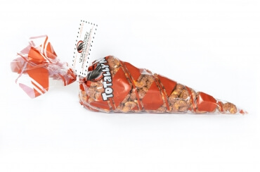 1 pound of freshly roasted cinnamon glazed cashews in a totally nutz poly bag, snack bag of cashews